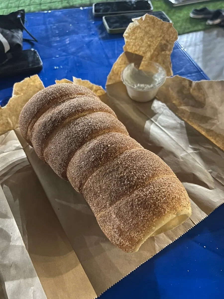 Cinnamon chimney bread set with whipped cream