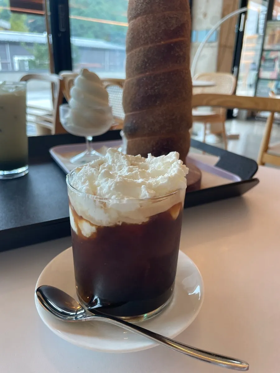 Table with drinks and desserts together