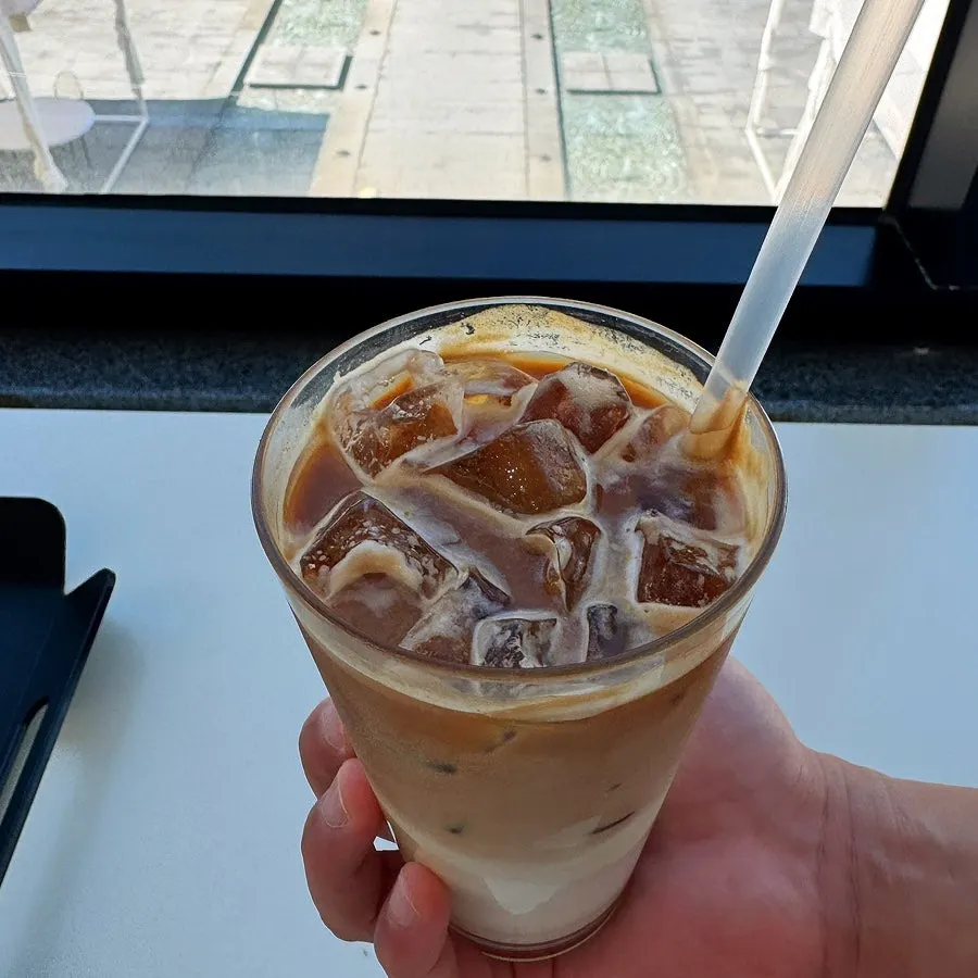 A glass of Luonto's iced caffe latte