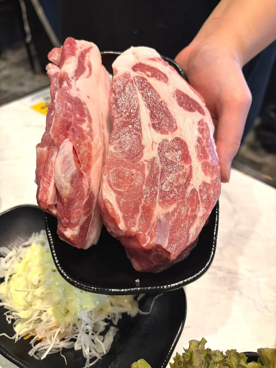 Raw pork checked at the table