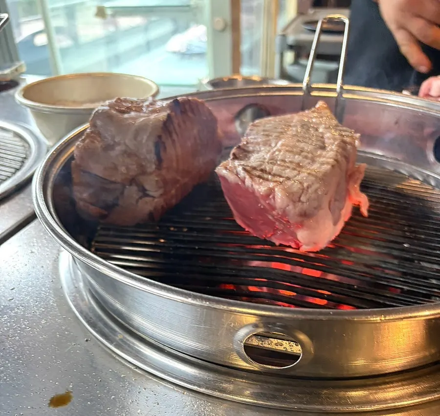 Black pork checked before the initial grill