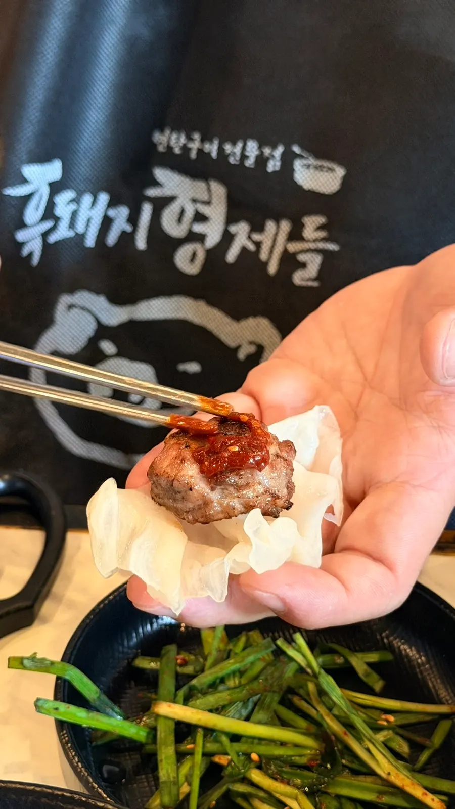 Cross section of pork neck grilled crispy outside, juicy inside