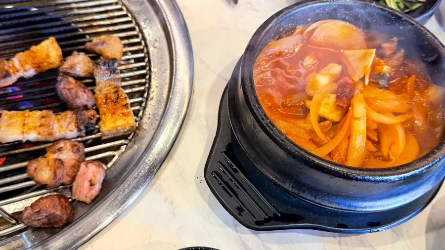 Gochujang jjigae packed with black pork, served with rice