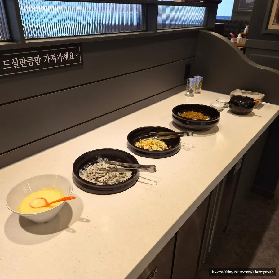 Self-serve banchan bar in the middle of the restaurant