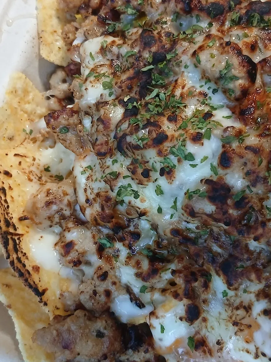 Full spread of meat sobo nachos with added toppings