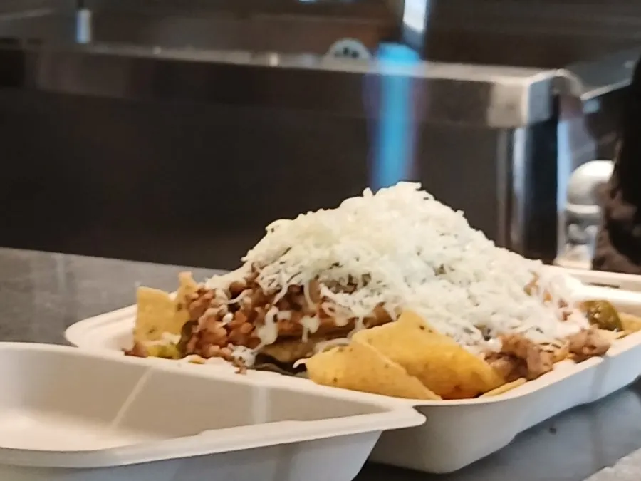 Full shot of the meat sobo nachos with added cheese