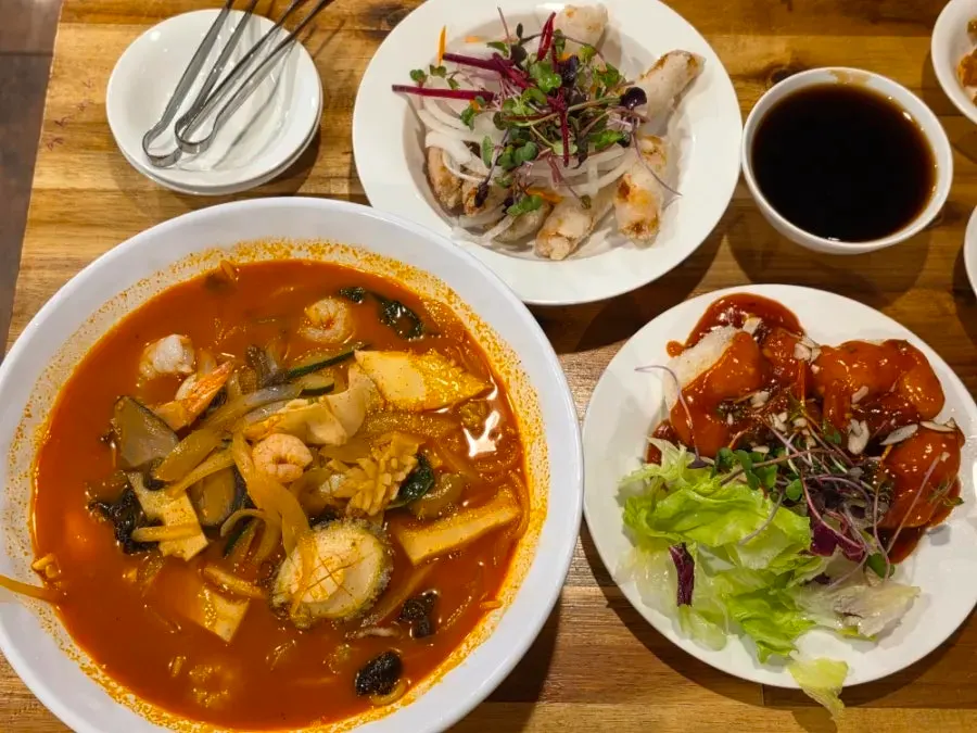 Three Chinese dishes served together on the table