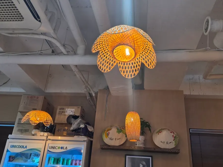 Bamboo Vietnamese-style lamps and warm yellow lighting