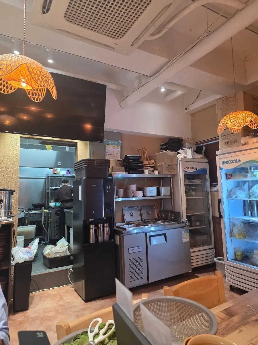 Madam Hao's open kitchen with cooking in view