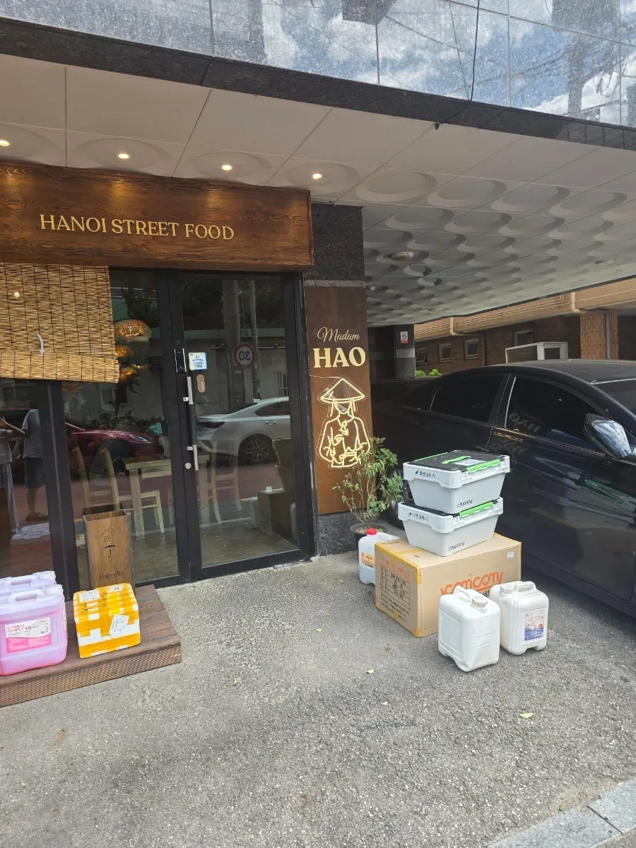 Front of Madam Hao on the ground floor of a villa building