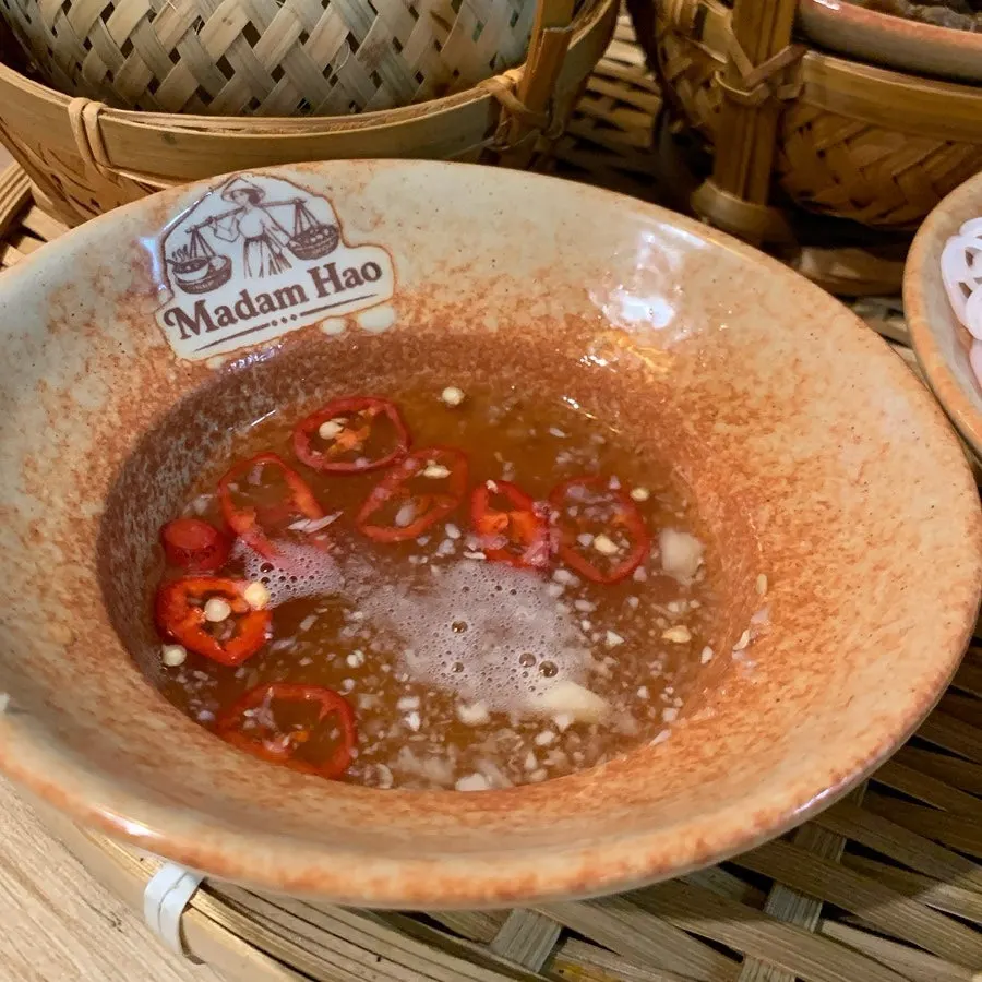Vegetables and sauce served with bun cha