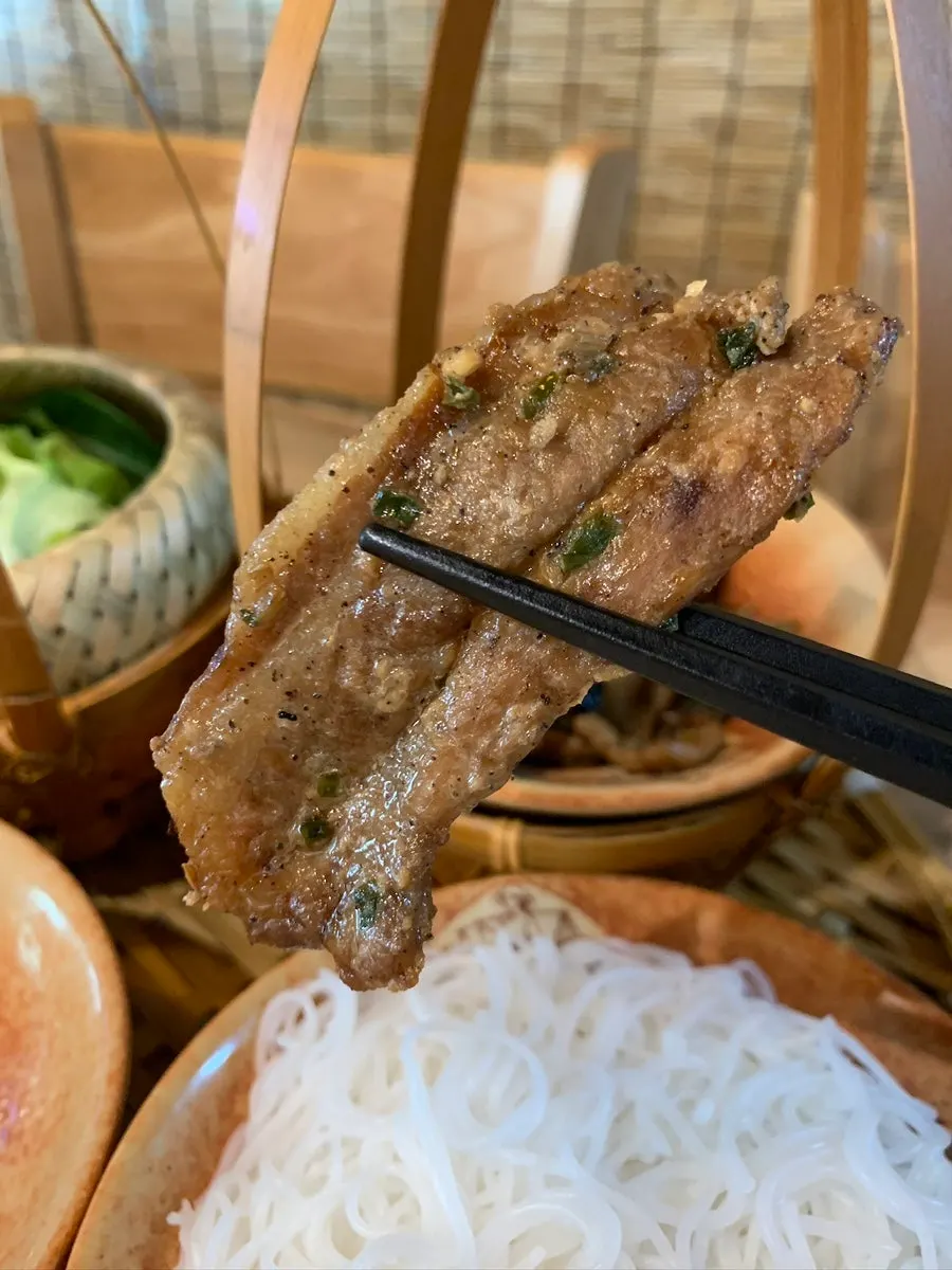 Bun cha salad with herb leaves