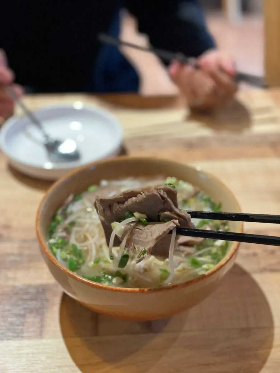 Generous portion of soft beef brisket in the pho