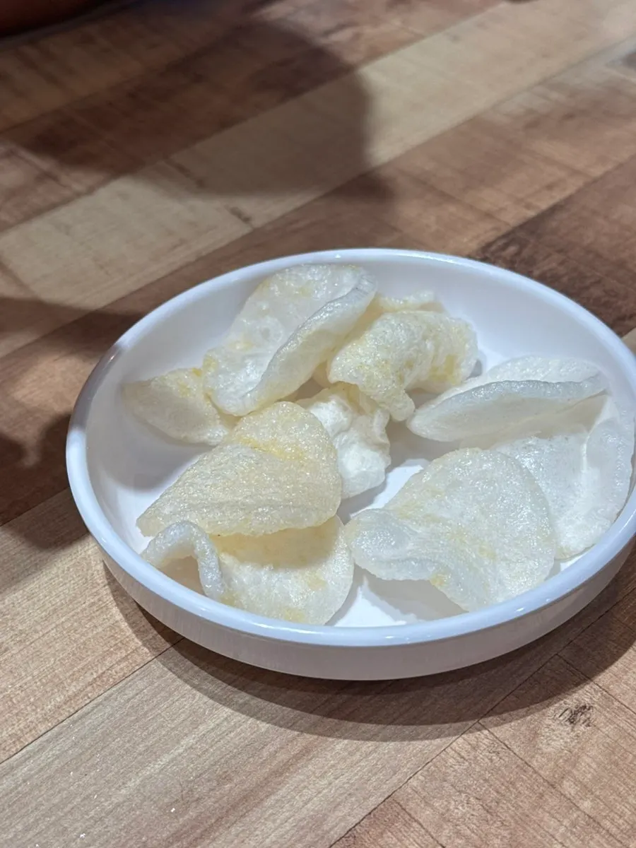 Shrimp chips served as a complimentary side