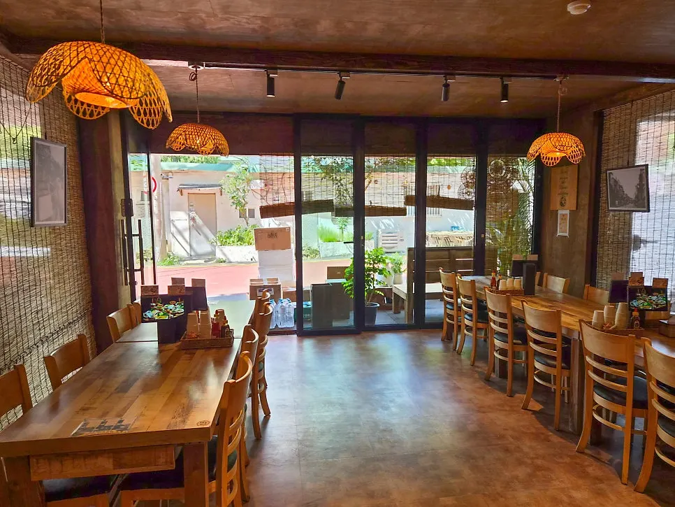 Spacious dining hall with plenty of tables at Madam Hao