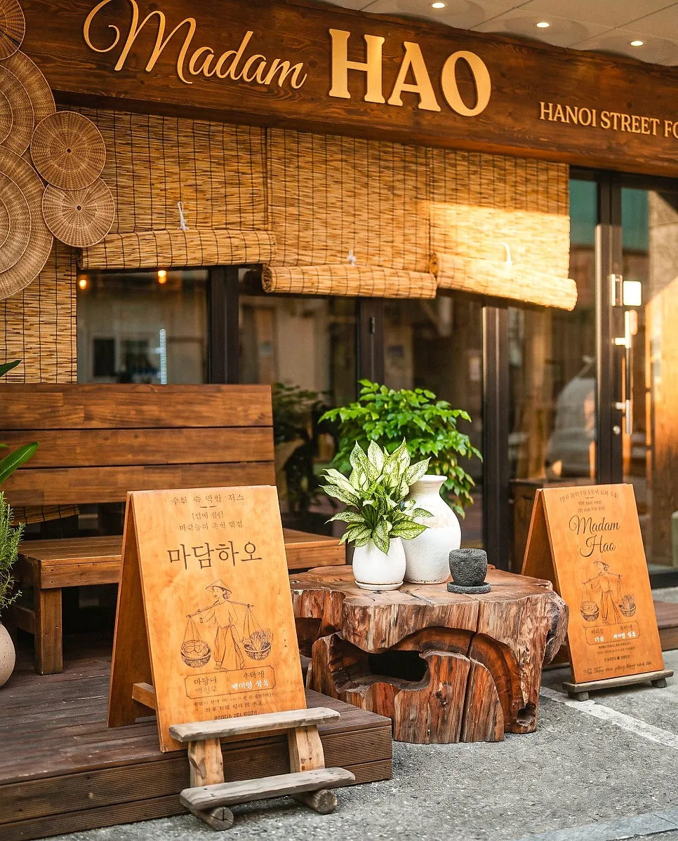 Madam Hao interior decorated with wood and plants