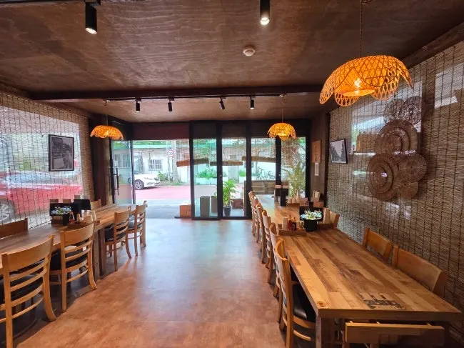 Madam Hao's dining room with wood tables lining both sides