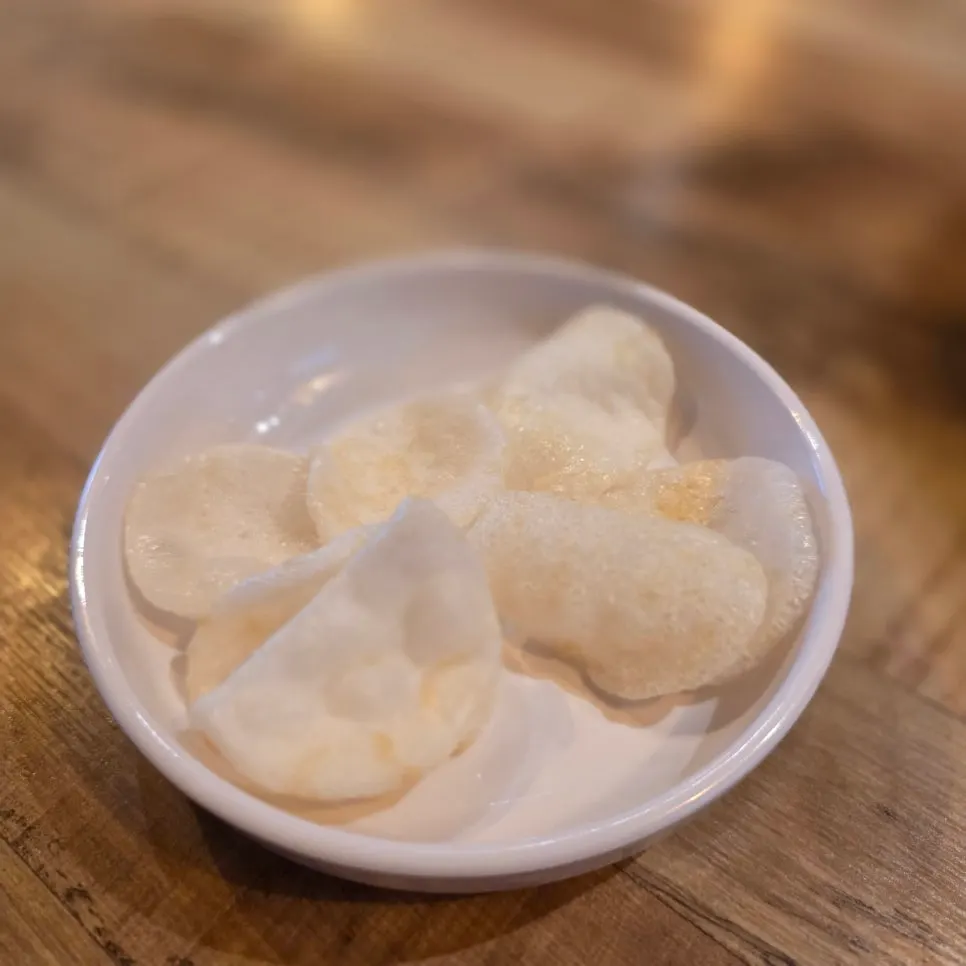 Shrimp chips served as the default side dish