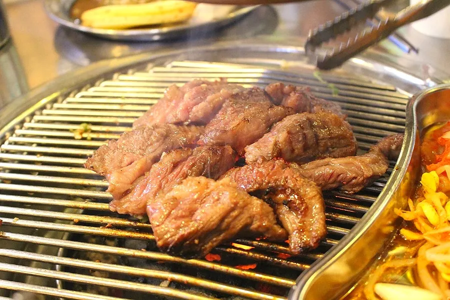 Thick marinated beef galbisal on the grill