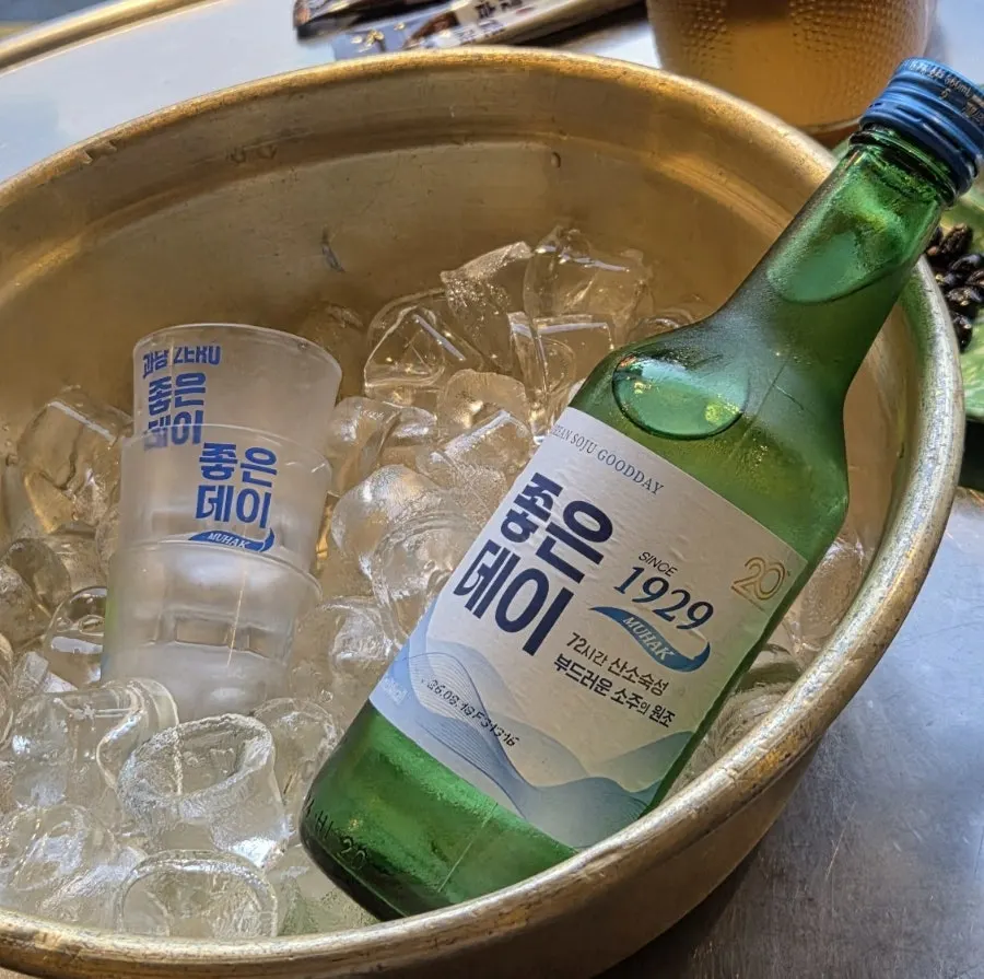 Soju and shot glasses served in ice