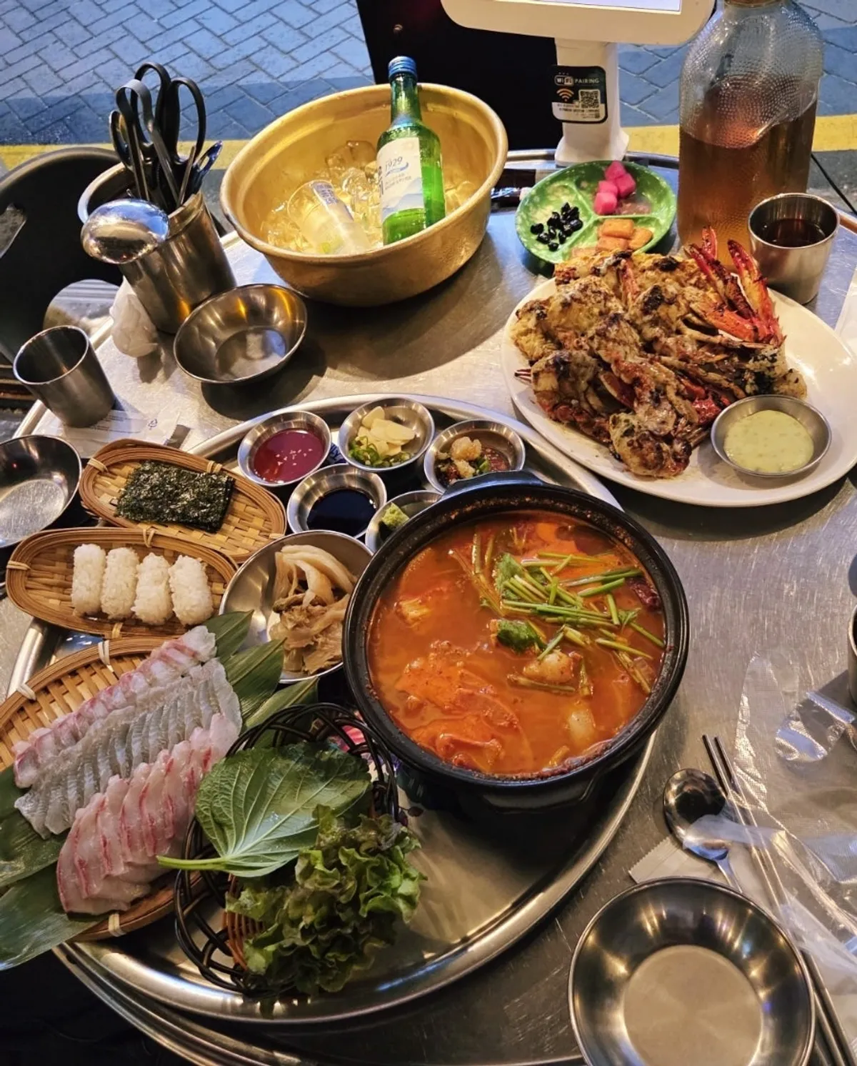 Table set with food at Maenggu Pocha Gwang-an Main Branch