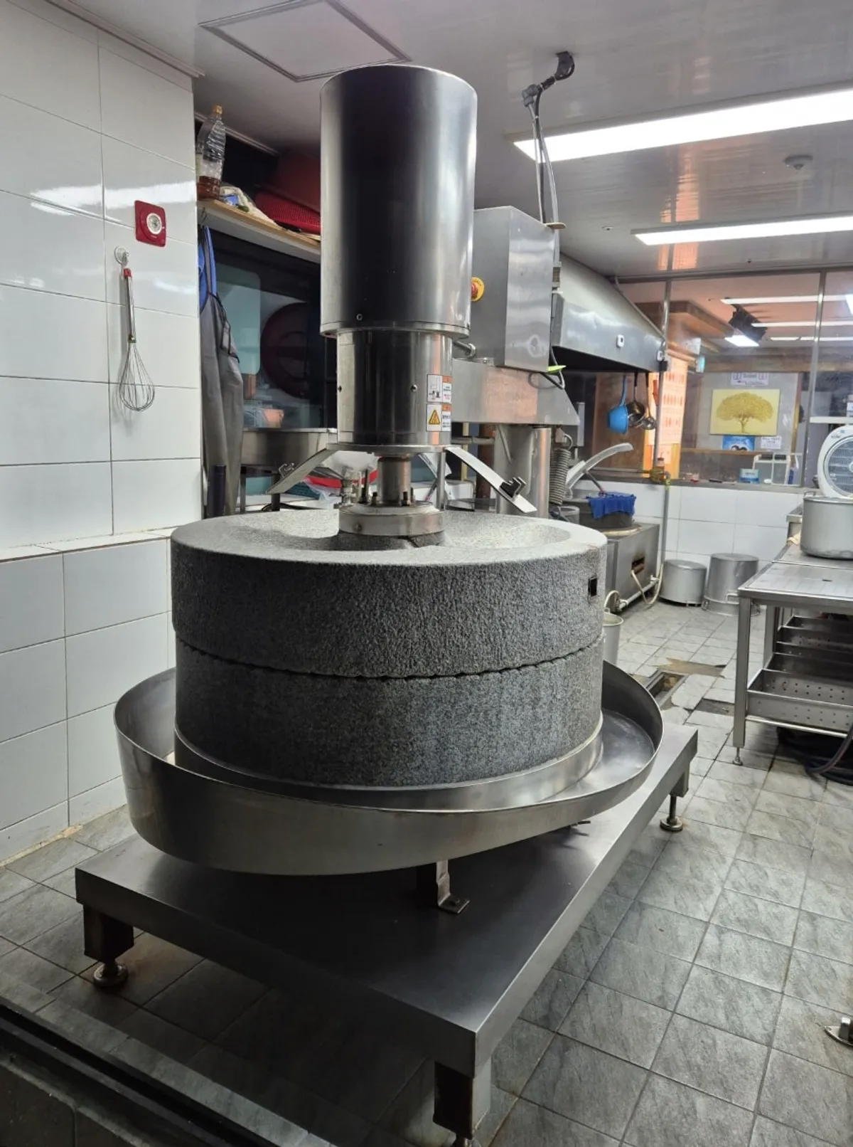 Patented large millstone at the entrance