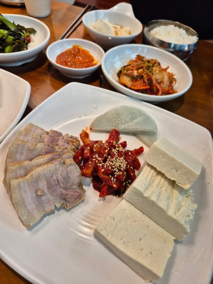 Bossam and plain tofu served with the set meal