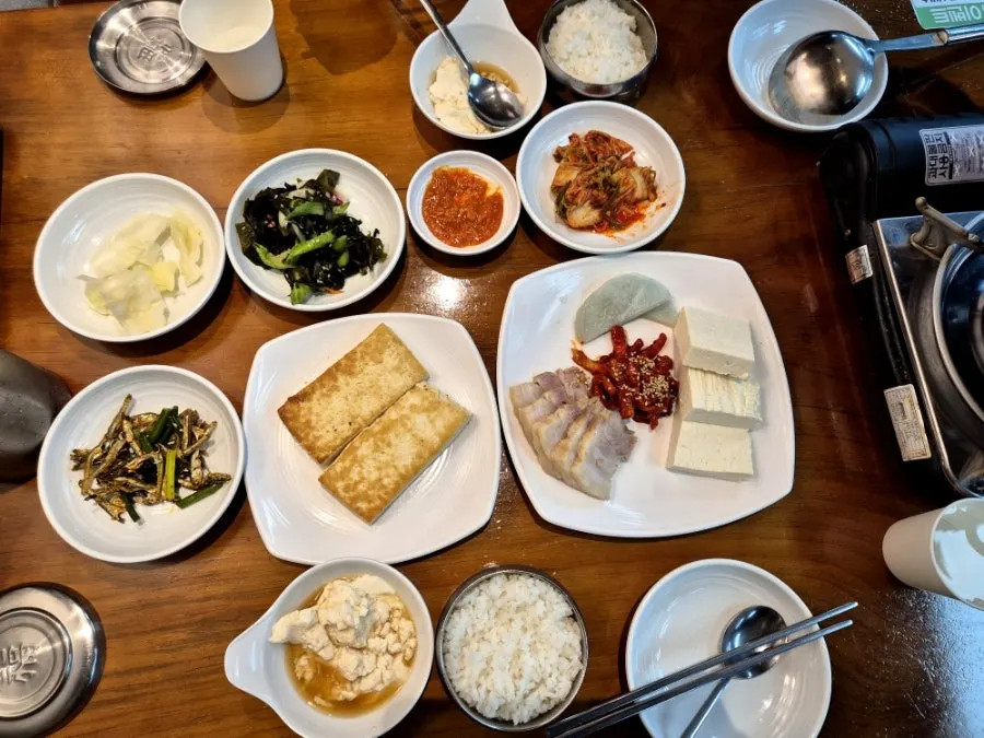 Pot of tofu hot pot packed with vegetables