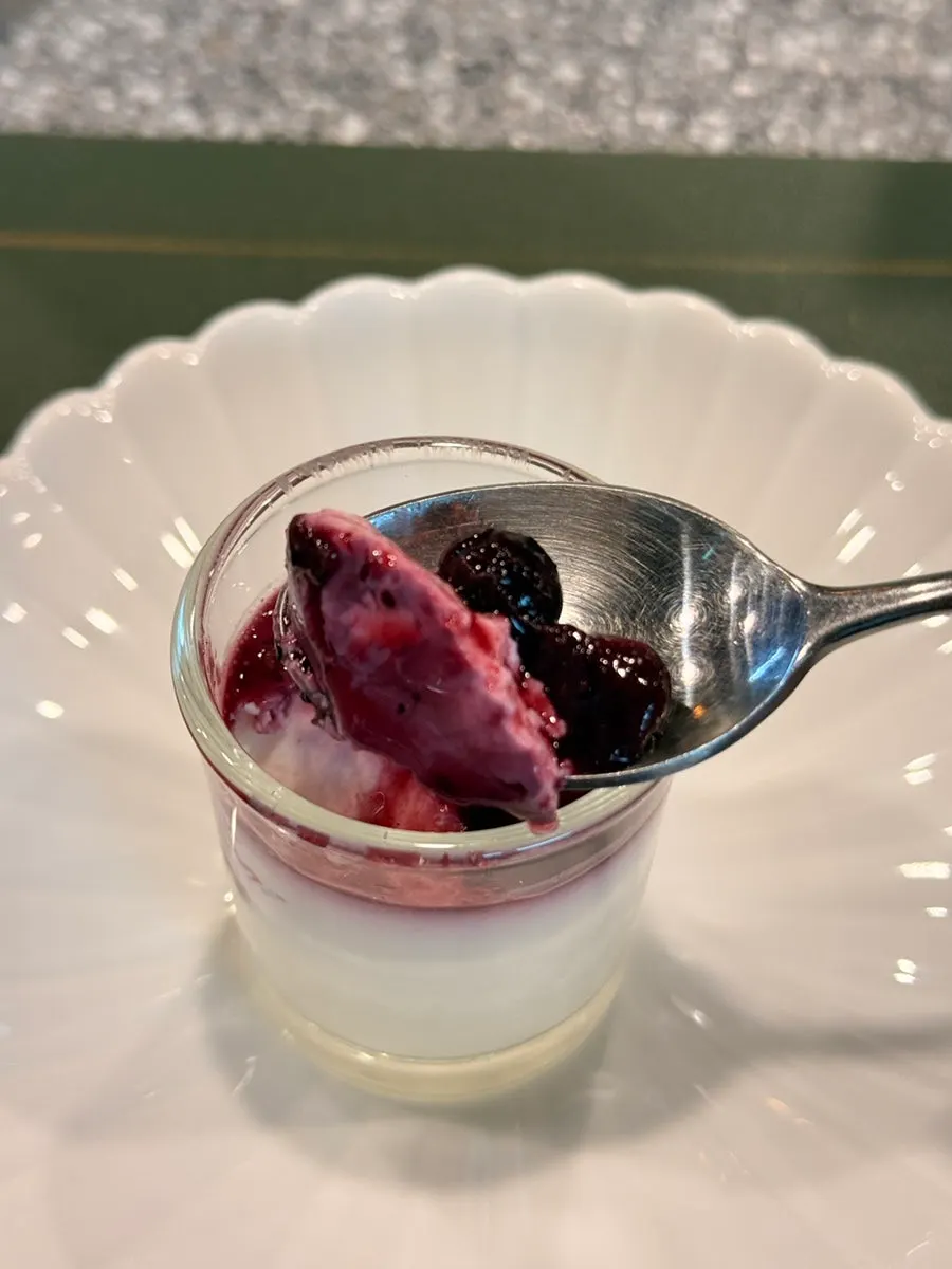 A plate of milky panna cotta dessert