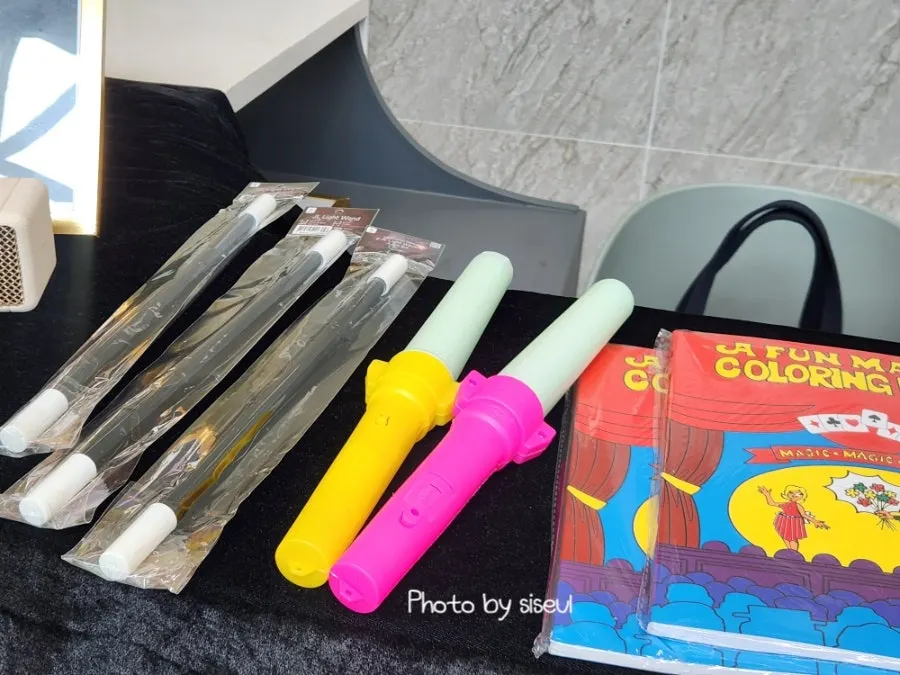 Magic tools including a magic wand and magic picture book