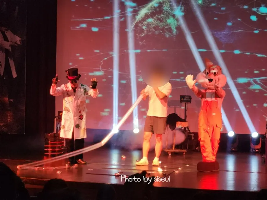 Parent and child joining together on stage