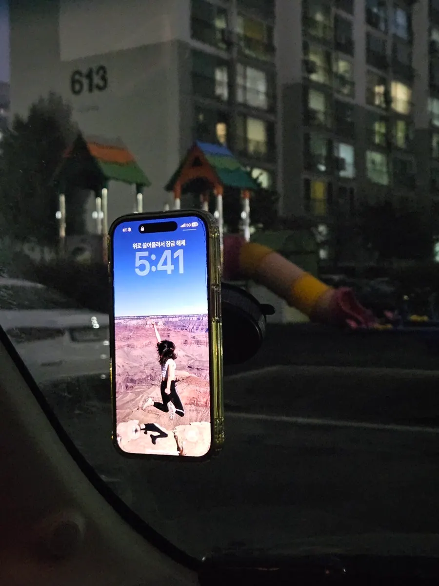 Car phone mount demonstrating its holding power