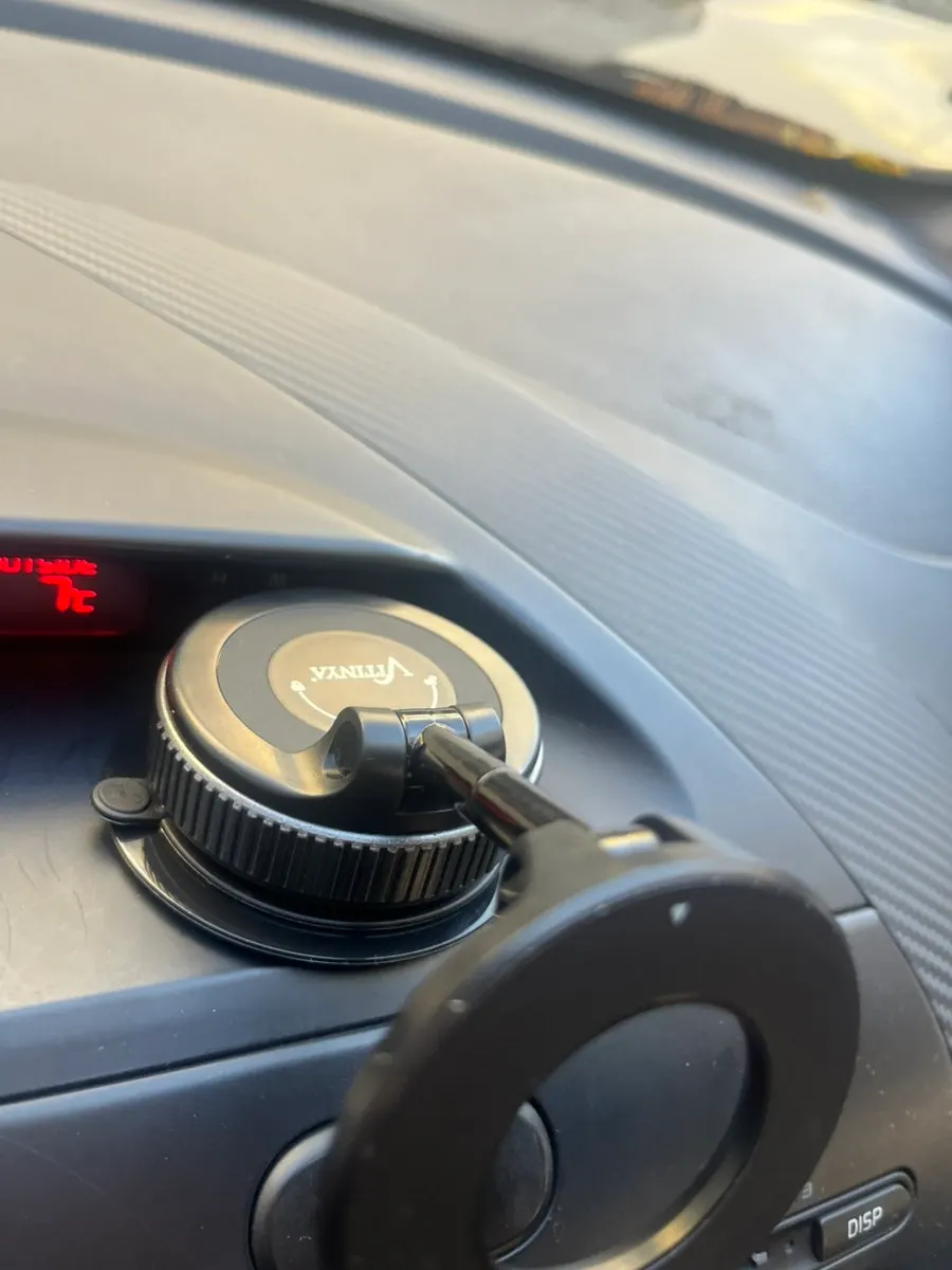 Car phone mount with metallic accents