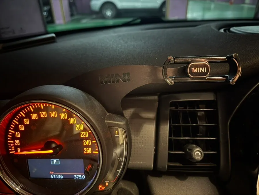 Broken old car phone mount