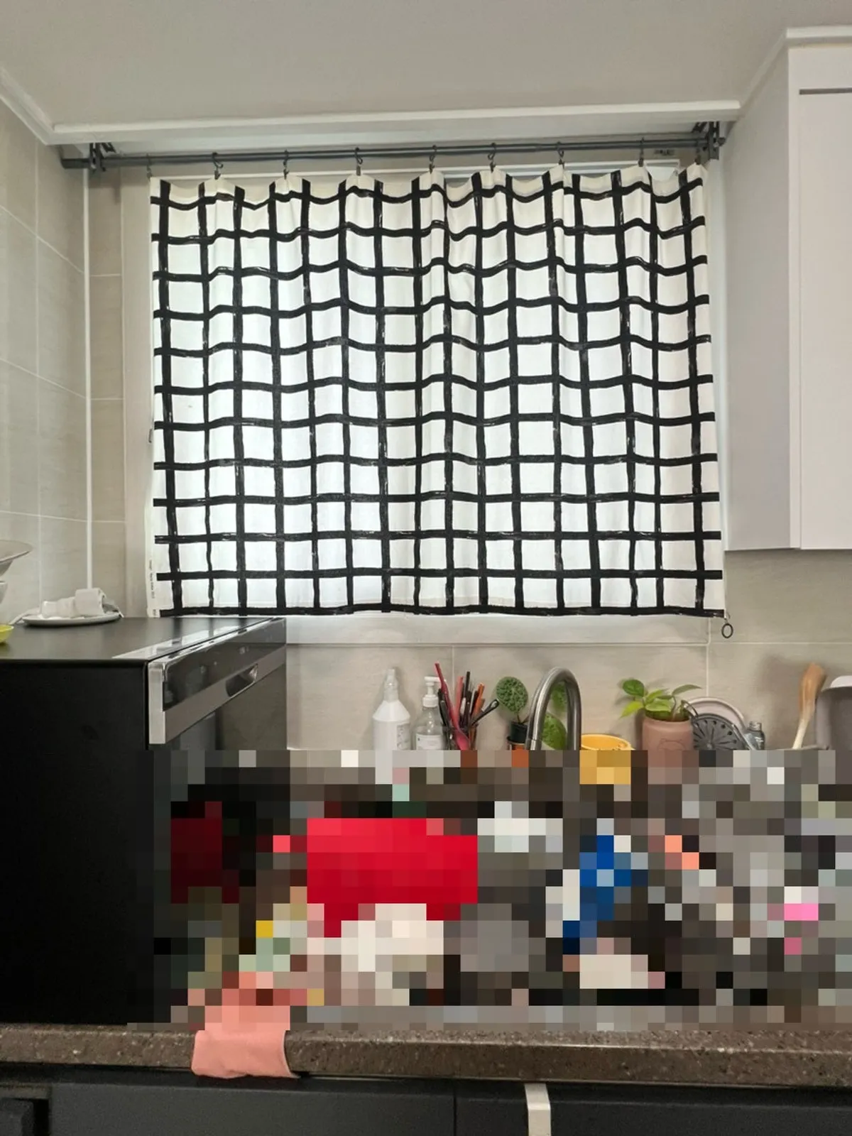 Using the suction mount on a kitchen window