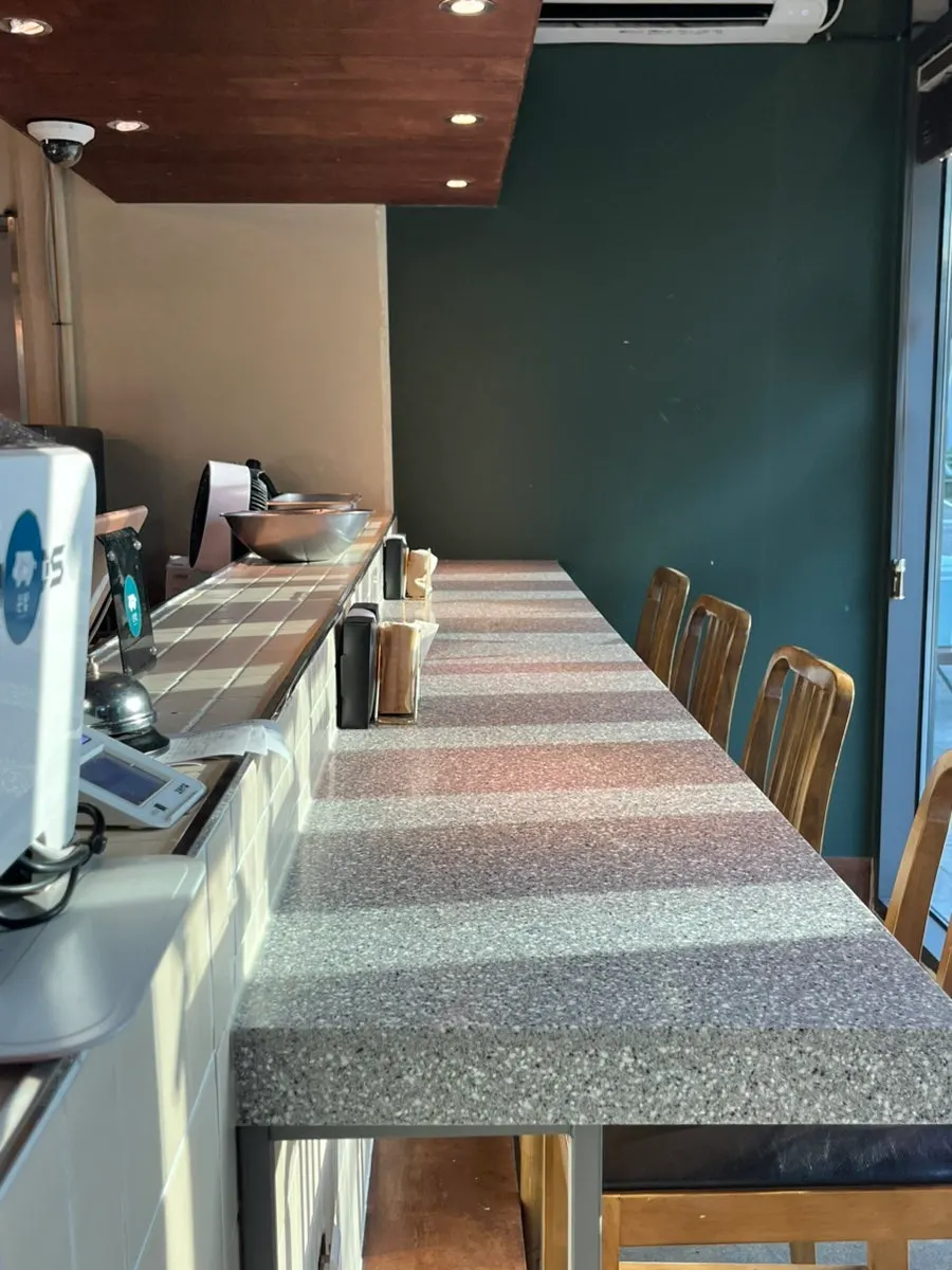 Interior of Don Tamguso showing the bar seating