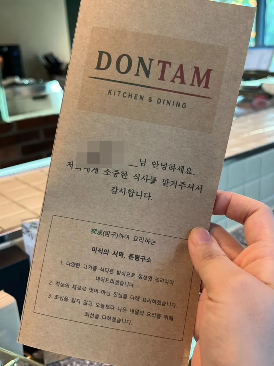 Table setting at Don Tamguso with the reserved guest's name placed at the seat