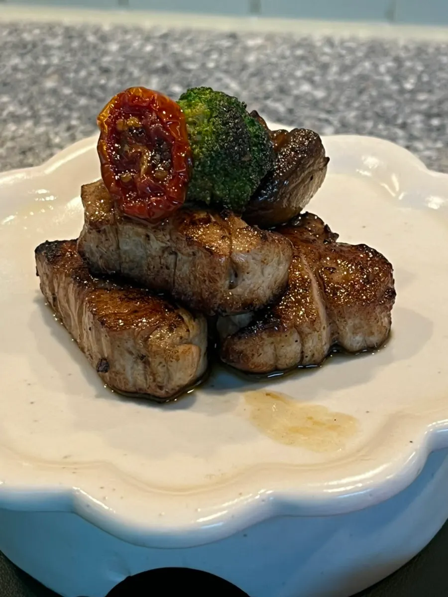 Main course of pork tenderloin with truffle aroma