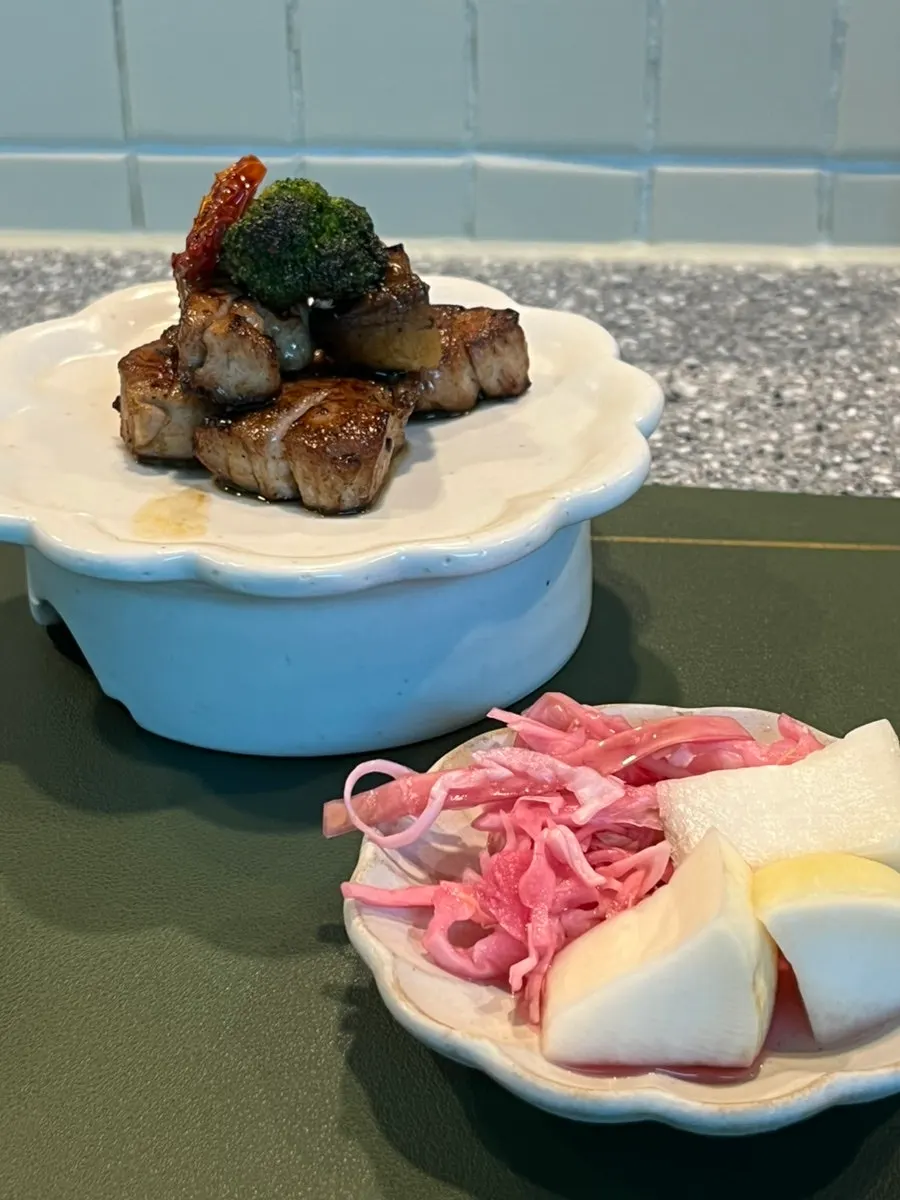 Pork tenderloin served with dongchimi pickle