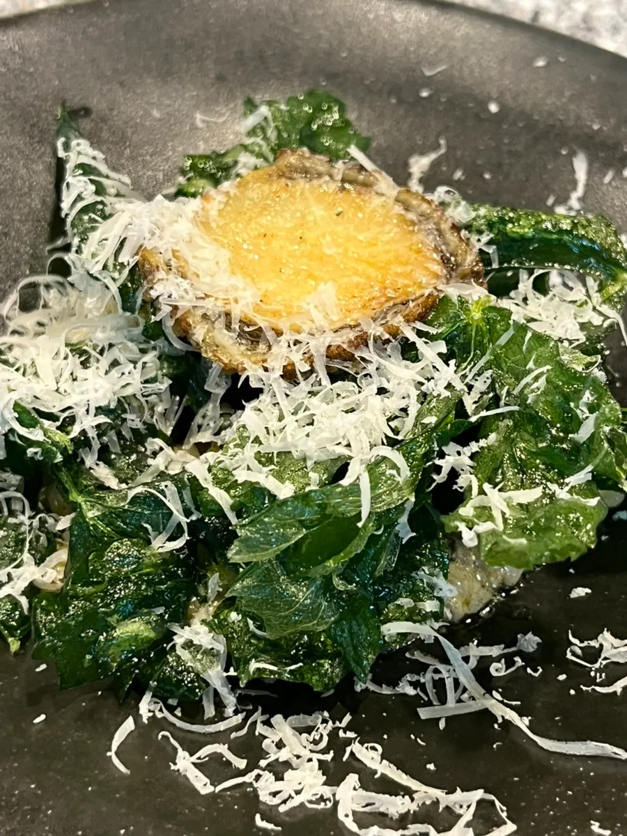 Abalone risotto topped with grana padano cheese