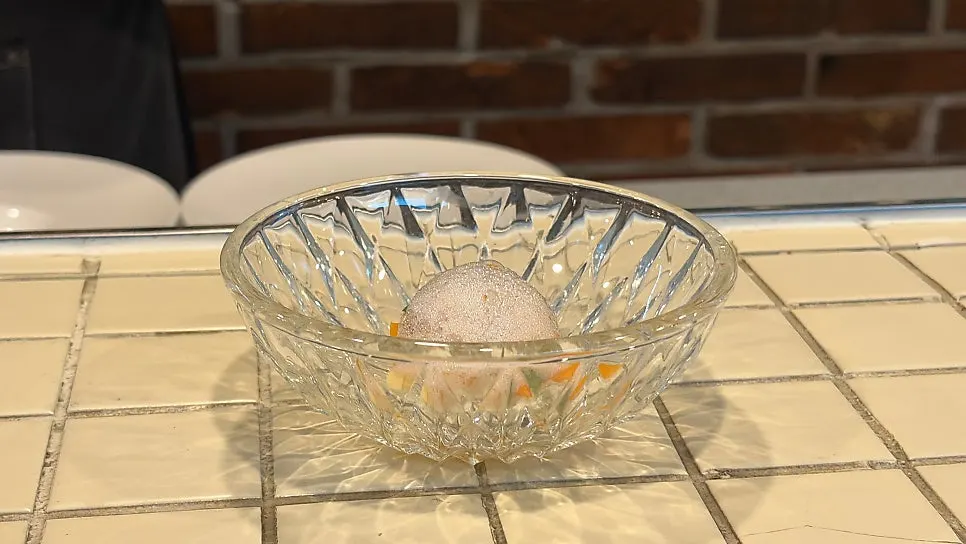 Fruit salad with dried persimmon and prosciutto