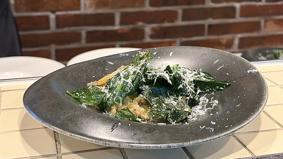 Minari salad served with the pork belly