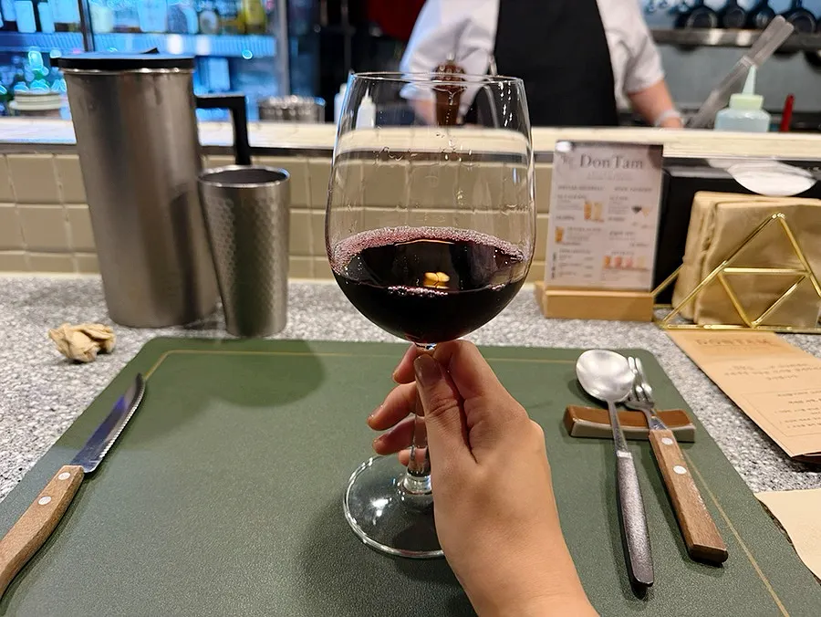 A glass of wine enjoyed with the course