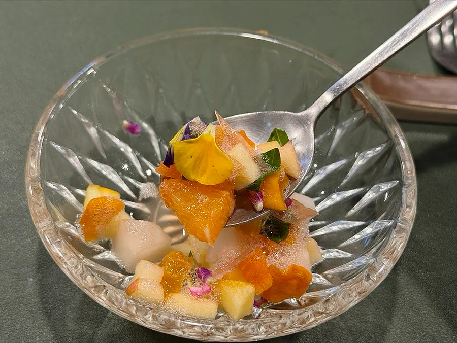Autumn fruit salad topped with persimmon vinegar foam