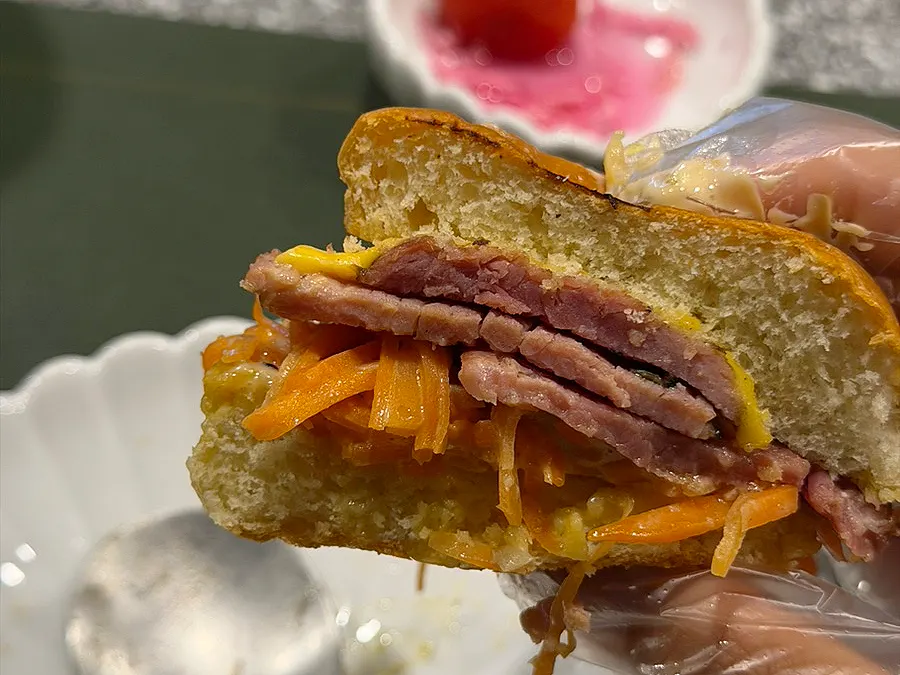 Don Tamguso signature burger cut in half