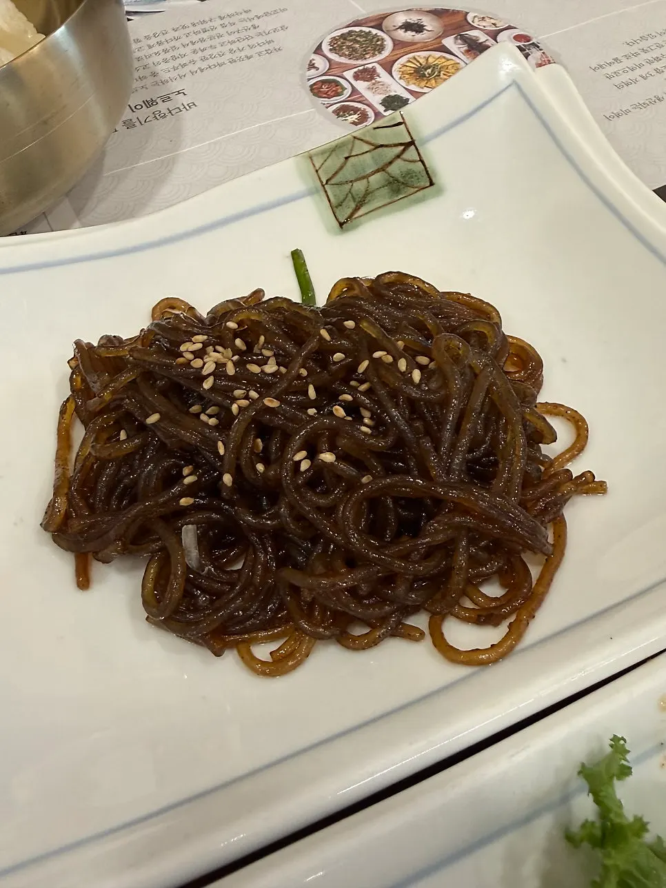 Basic side dishes including seasoned vegetables and japchae