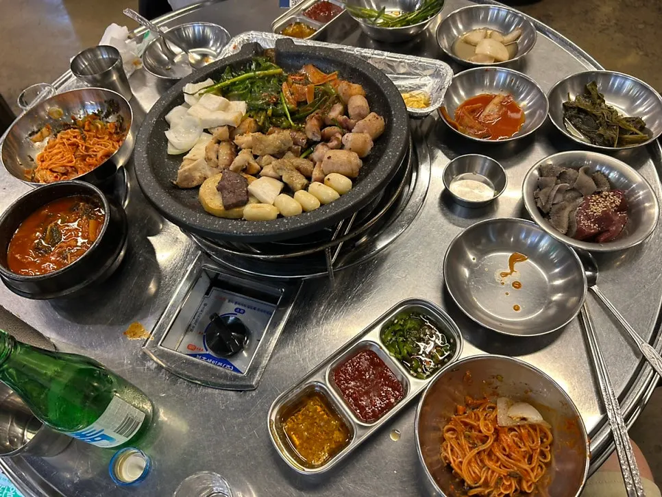 Interior of the gopchang restaurant full of customers on a weekday evening