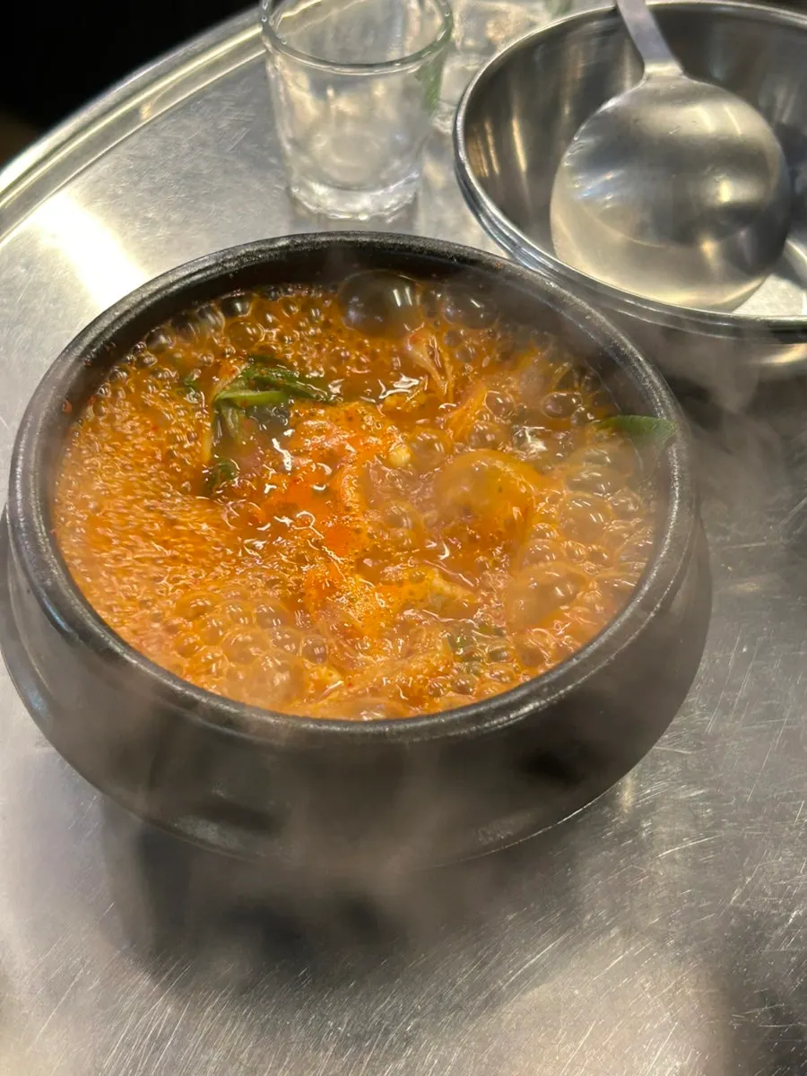 Grilled yeomtong dipped in sesame oil sauce