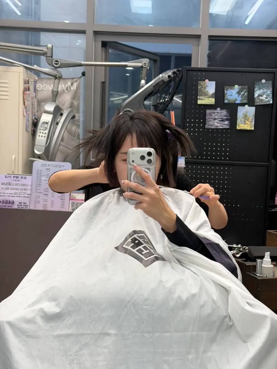 The bob cut performed before the dye job