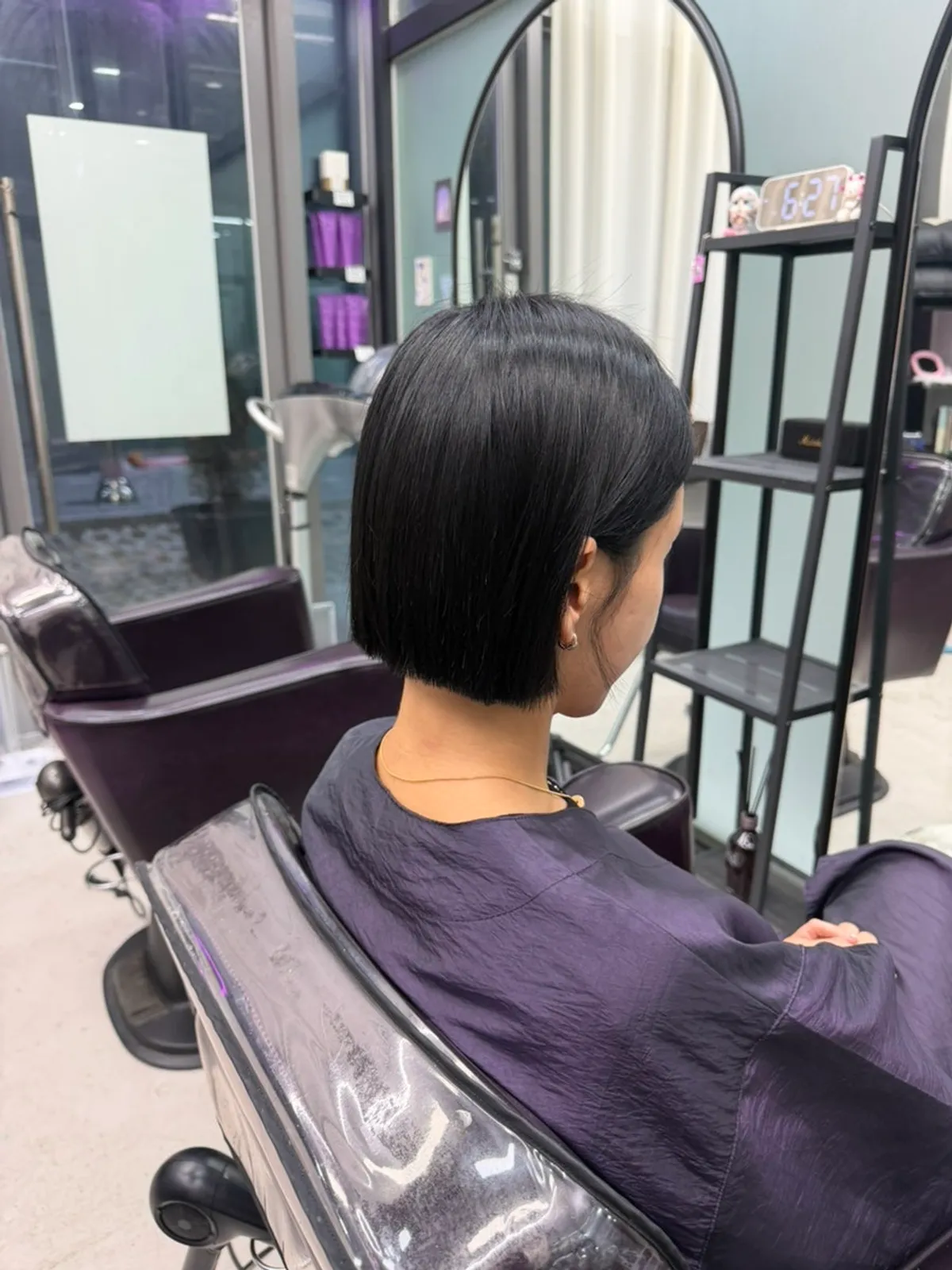 Final shot of the bob styled in even black color